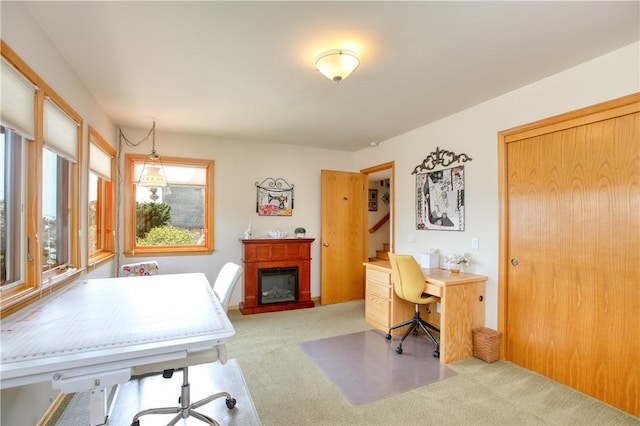 1660 Saint Thomas Ave, Cambria, CA 93428 - office area featuring carpet floors and a glass covered fireplace
