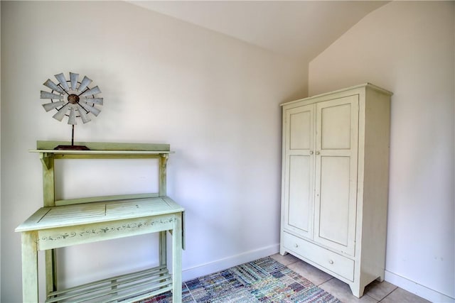1660 Saint Thomas Ave, Cambria, CA 93428 - unfurnished office with vaulted ceiling, light tile patterned flooring, and baseboards