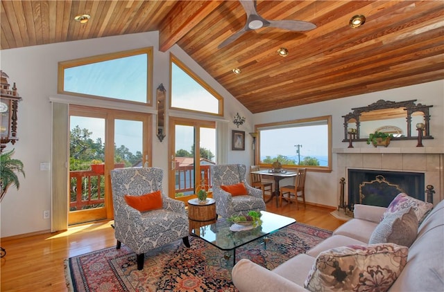 1660 Saint Thomas Ave, Cambria, CA 93428 - living area with ceiling fan, wood ceiling, wood finished floors, baseboards, and high vaulted ceiling