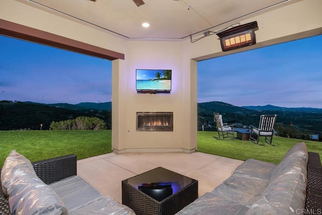 3881 Rancho Summit Dr, Encinitas, CA 92024 - view of patio / terrace with an outdoor living space with a fireplace