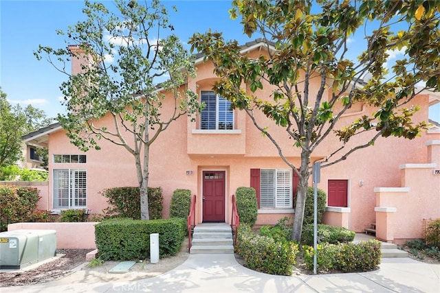 multi unit property featuring stucco siding