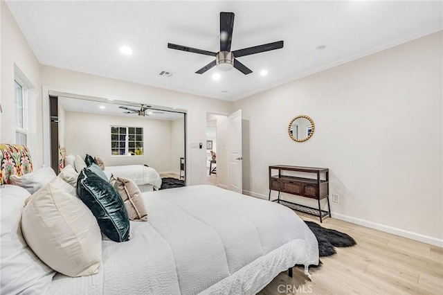bedroom with ceiling fan, recessed lighting, baseboards, wood finished floors, and visible vents