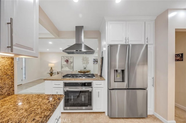 kitchen featuring white cabinets, stainless steel appliances, extractor fan, and light stone counters