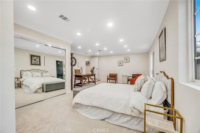 bedroom with carpet floors, recessed lighting, and visible vents