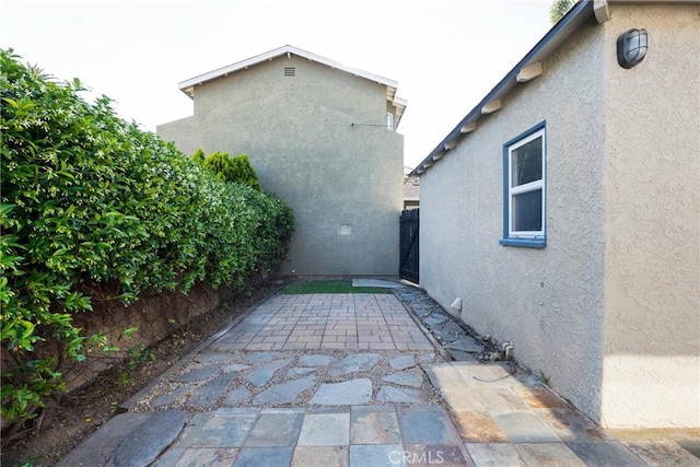 view of patio / terrace featuring fence
