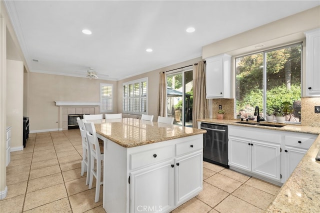 4677 Willow Bend Ct, Chino Hills, CA 91709 - kitchen featuring a sink, dishwasher, tasteful backsplash, a kitchen island, and ornamental molding