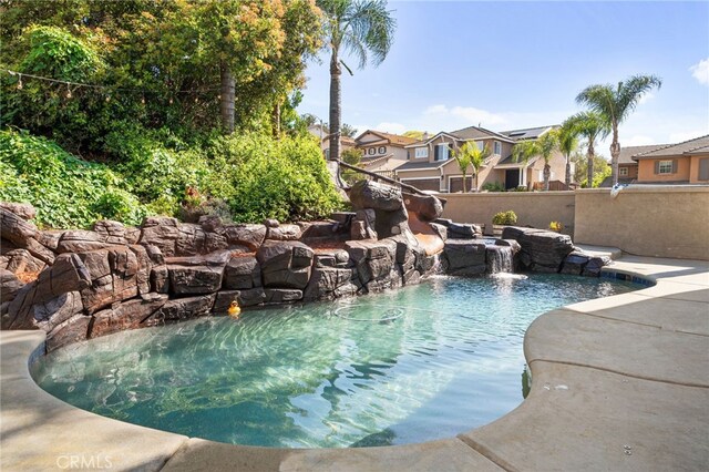 4677 Willow Bend Ct, Chino Hills, CA 91709 - view of pool featuring a fenced in pool, fence, and a residential view