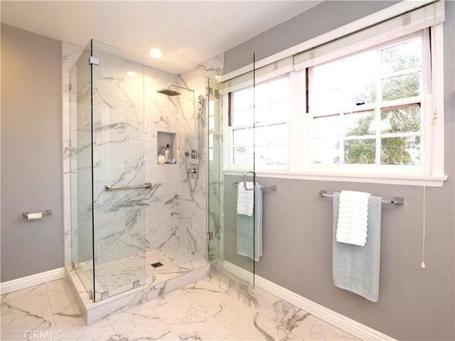 bathroom with baseboards, radiator heating unit, a marble finish shower, and marble finish floor