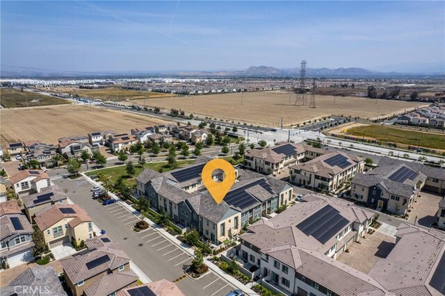 aerial view with a mountain view and a residential view