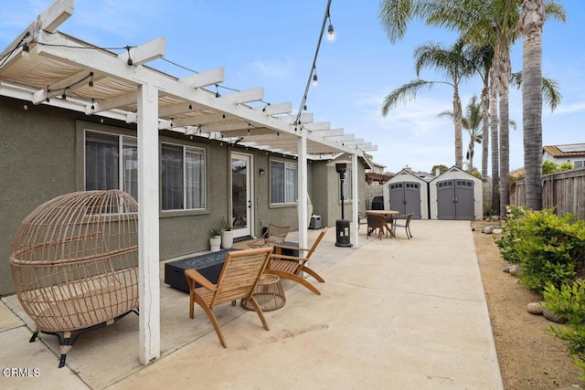 view of patio featuring an outdoor living space, an outbuilding, fence, a shed, and a pergola