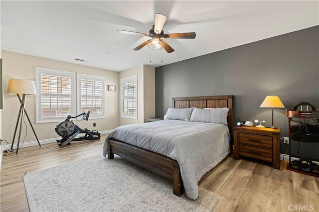 28292 N Via Sonata Dr, Valencia, CA 91354 - bedroom with wood finished floors, baseboards, and a ceiling fan