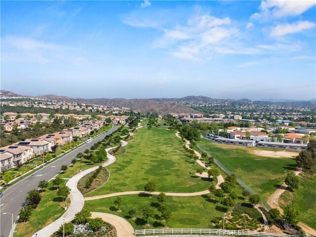 28292 N Via Sonata Dr, Valencia, CA 91354 - aerial view of property and surrounding area featuring a mountain backdrop and nearby suburban area