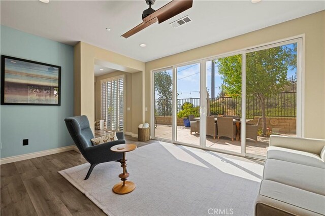28292 N Via Sonata Dr, Valencia, CA 91354 - living area featuring wood finished floors, baseboards, recessed lighting, and ceiling fan