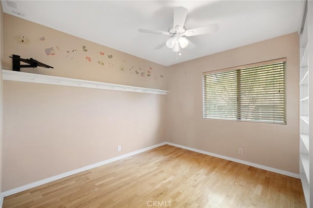 16562 Orangewind Ln, Riverside, CA 92503 - spare room with wood finished floors, ceiling fan, and baseboards