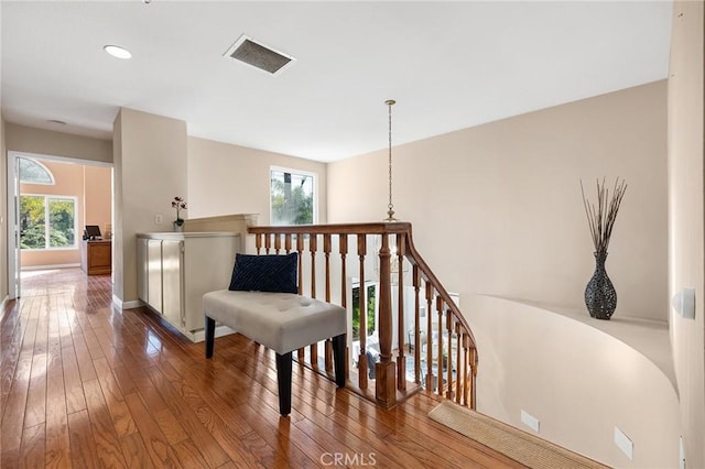 16562 Orangewind Ln, Riverside, CA 92503 - corridor featuring an upstairs landing, hardwood / wood-style floors, recessed lighting, and baseboards