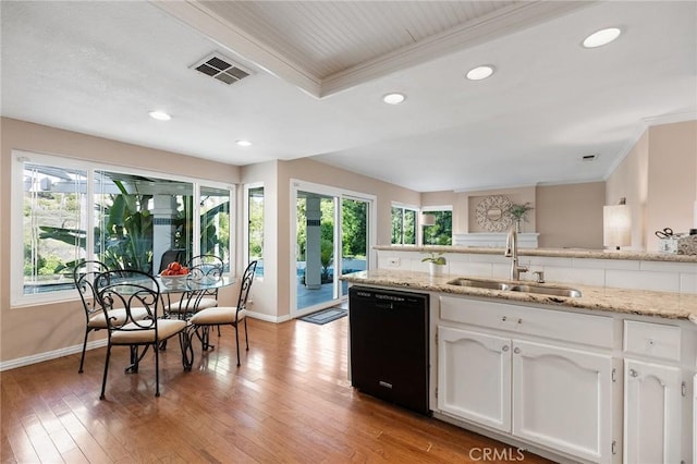 16562 Orangewind Ln, Riverside, CA 92503 - kitchen featuring black dishwasher, a sink, ornamental molding, white cabinets, and recessed lighting