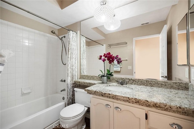 16562 Orangewind Ln, Riverside, CA 92503 - full bath featuring vanity, shower / bath combination with curtain, toilet, and a chandelier