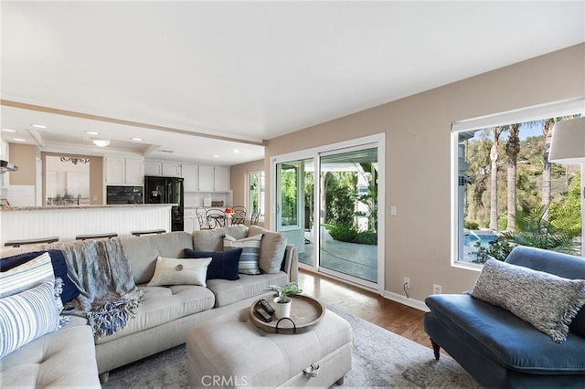 16562 Orangewind Ln, Riverside, CA 92503 - living area with recessed lighting, dark wood-style flooring, and baseboards