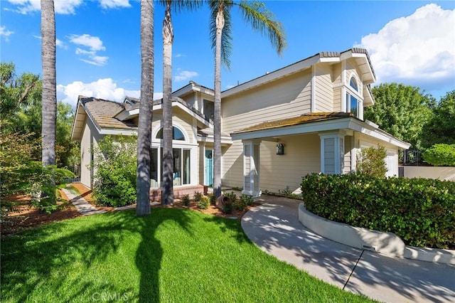 16562 Orangewind Ln, Riverside, CA 92503 - view of front of property with a front yard and a garage
