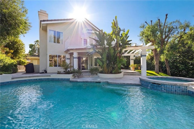 16562 Orangewind Ln, Riverside, CA 92503 - view of swimming pool with a pool with connected hot tub and a patio area