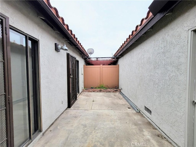 view of patio / terrace with fence