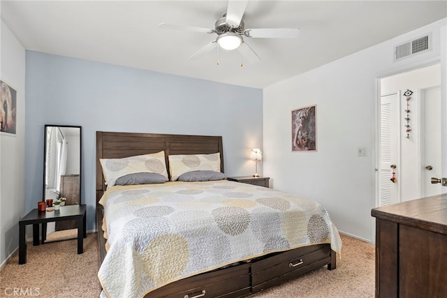 bedroom with light colored carpet, baseboards, ceiling fan, and visible vents