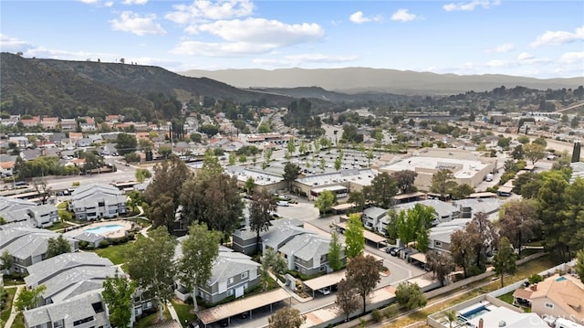 bird's eye view with a residential view and a mountain view