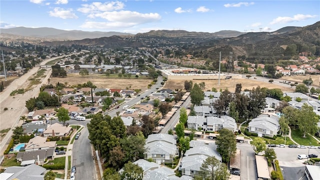 bird's eye view with a mountain view and a residential view