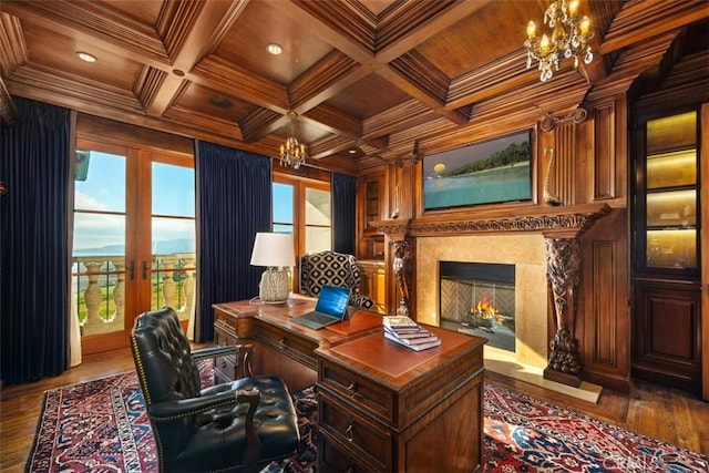 office area featuring crown molding, wood finished floors, a chandelier, and wooden ceiling