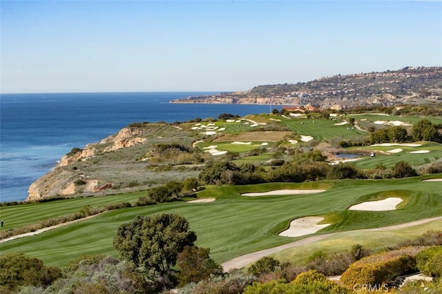 view of property's community with a water view and golf course view