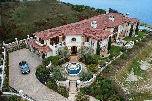 birds eye view of property featuring a water view