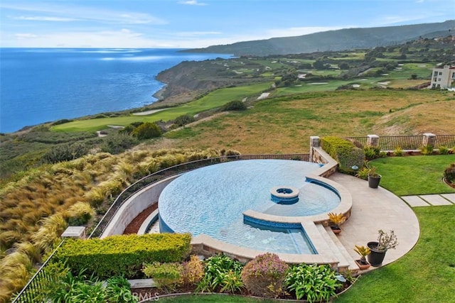 birds eye view of property featuring a water and mountain view and view of golf course