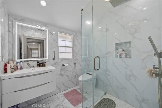 full bathroom featuring a marble finish shower, vanity, toilet, and marble finish floor