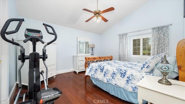 bedroom featuring baseboards, a ceiling fan, wood finished floors, and lofted ceiling