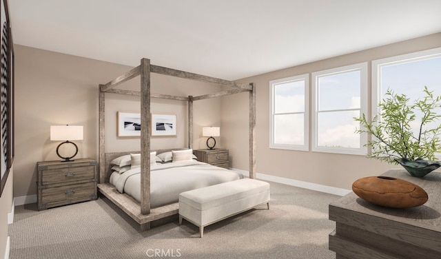 carpeted bedroom featuring baseboards