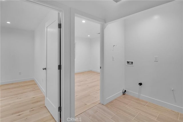 laundry area featuring laundry area, light wood-style floors, hookup for a washing machine, recessed lighting, and baseboards