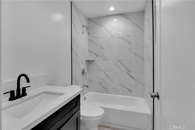 full bathroom with recessed lighting, vanity, toilet, and  shower combination