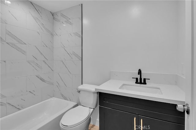 bathroom with vanity, toilet, and shower / washtub combination