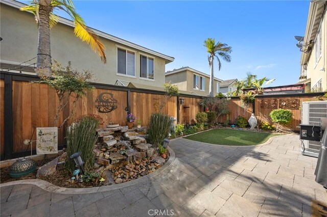 9 Woodlake Dr, Buena Park, CA 90621 - view of yard featuring a fenced backyard and a patio area