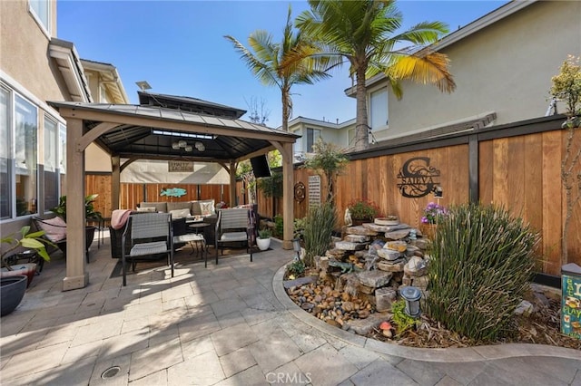 9 Woodlake Dr, Buena Park, CA 90621 - view of patio featuring a gazebo, outdoor lounge area, and a fenced backyard