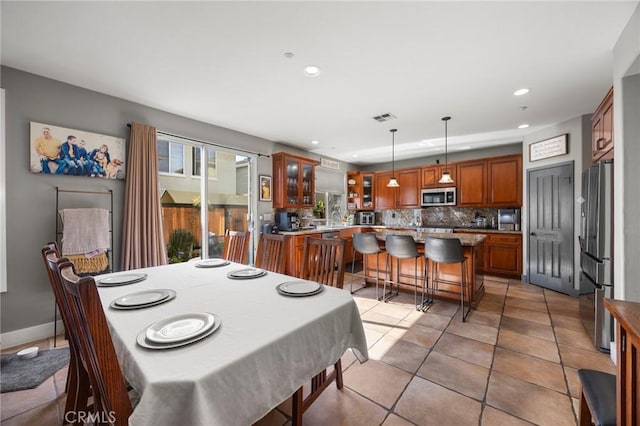 9 Woodlake Dr, Buena Park, CA 90621 - dining space featuring recessed lighting, light tile patterned flooring, and visible vents