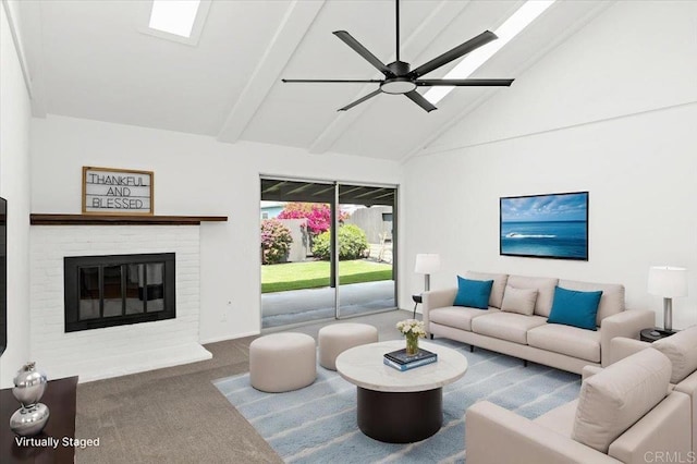 carpeted living room featuring a brick fireplace, ceiling fan, beam ceiling, and high vaulted ceiling