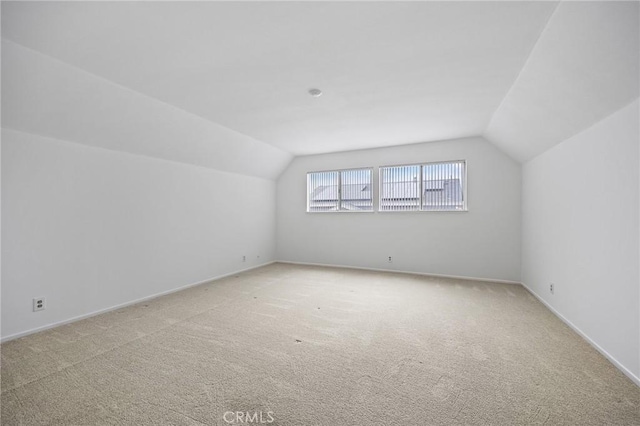 23692 Cavanaugh Rd, Lake Forest, CA 92630 - additional living space featuring vaulted ceiling, light carpet, and baseboards