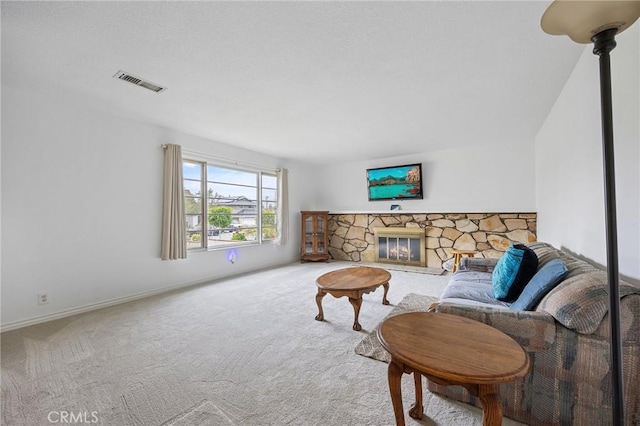 23692 Cavanaugh Rd, Lake Forest, CA 92630 - living area with carpet, a stone fireplace, and baseboards
