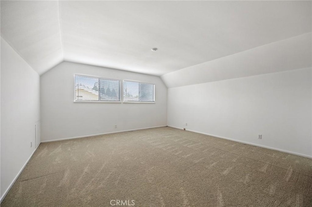 23692 Cavanaugh Rd, Lake Forest, CA 92630 - bonus room with vaulted ceiling, carpet, and baseboards