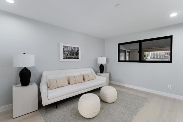 100 Coast Blvd Unit 101, La Jolla, CA 92037 - living room with wood finished floors, recessed lighting, and baseboards