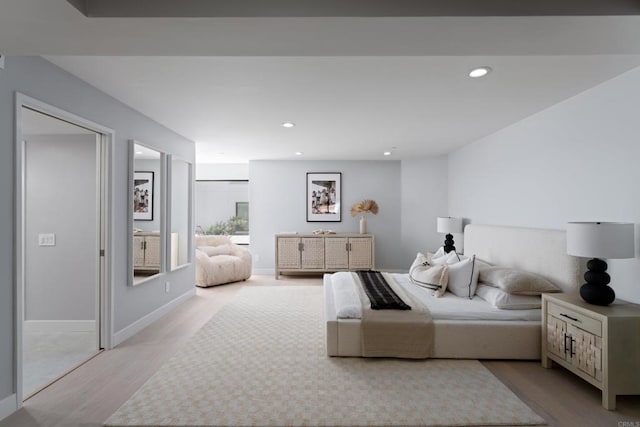 100 Coast Blvd Unit 101, La Jolla, CA 92037 - bedroom with light wood-type flooring, recessed lighting, and baseboards