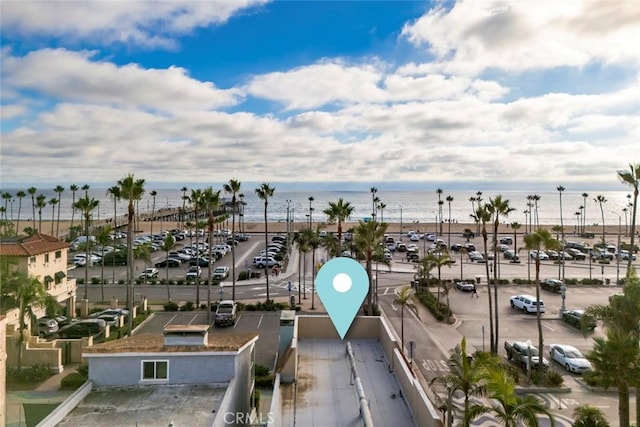 exterior space featuring a beach view