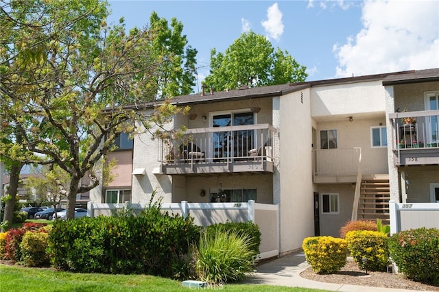 8990 19th St Unit 360, Rancho Cucamonga, CA 91701 - view of building exterior featuring fence