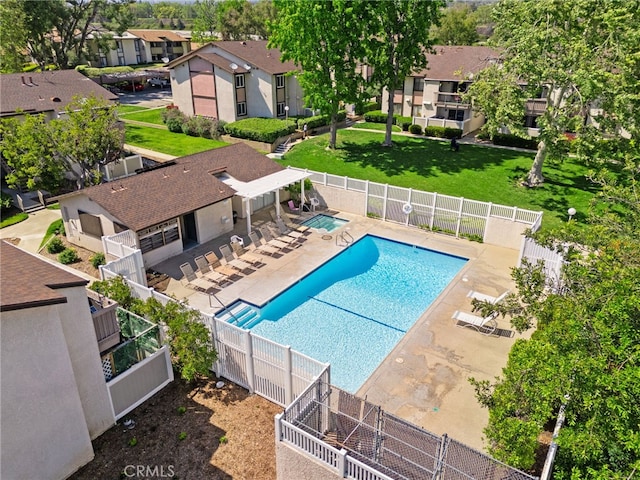 8990 19th St Unit 360, Rancho Cucamonga, CA 91701 - community pool with a residential view, a lawn, a fenced backyard, and a patio area